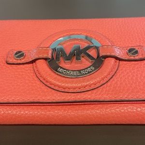 Michael Kors wallet never used but has wear due to storage. Coral pink 🪸